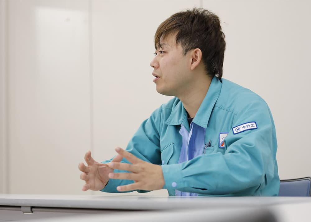 高橋 聡さん